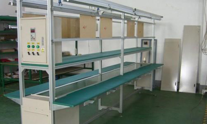 流水線生產(chǎn)廠家簡(jiǎn)述輸送線輸送帶跑偏的解決方法